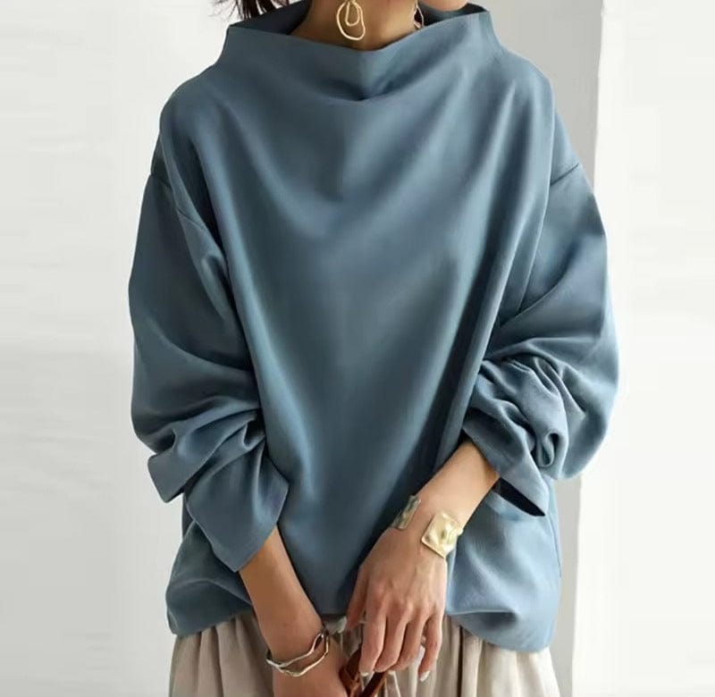 Candela | Top de Punto Suave con Cuello Alto y Corte Holgado