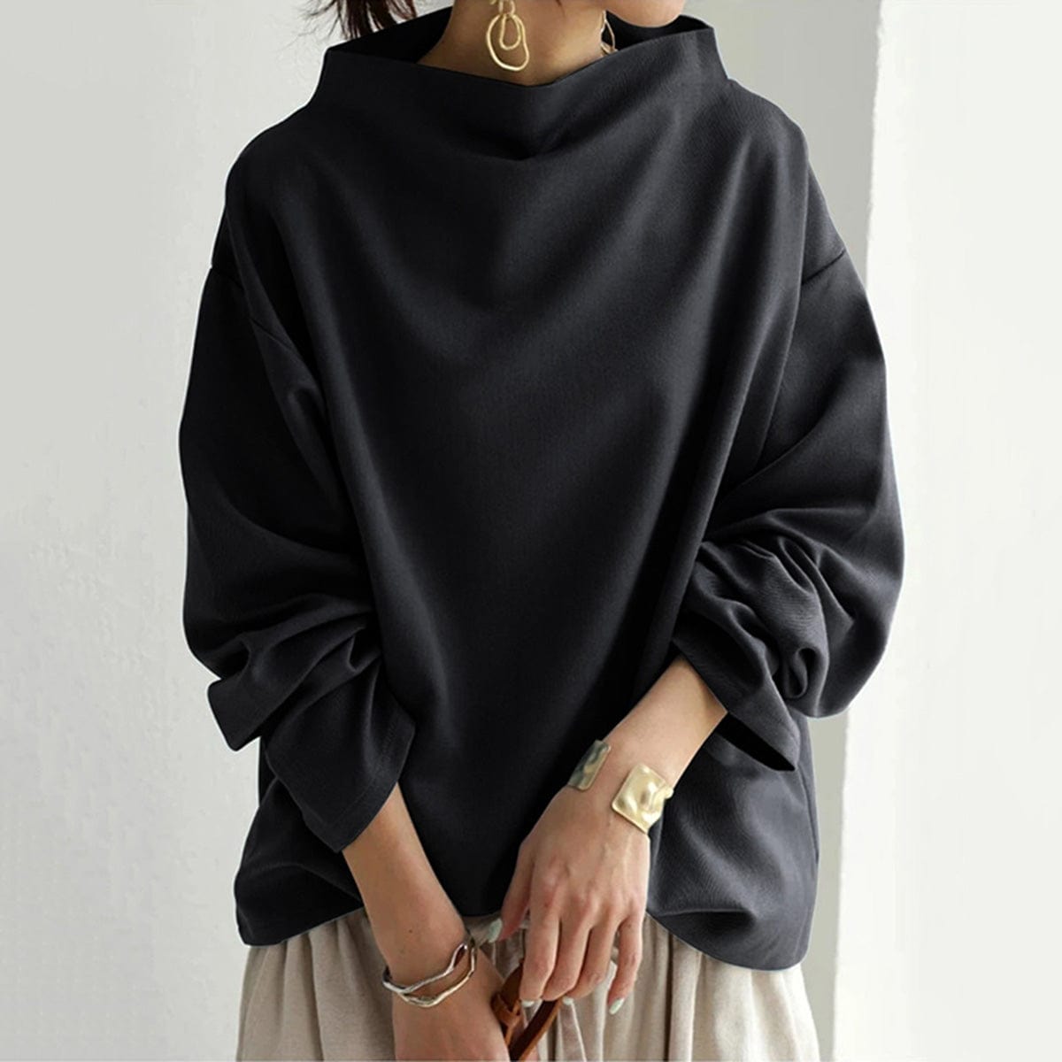 Candela | Top de Punto Suave con Cuello Alto y Corte Holgado